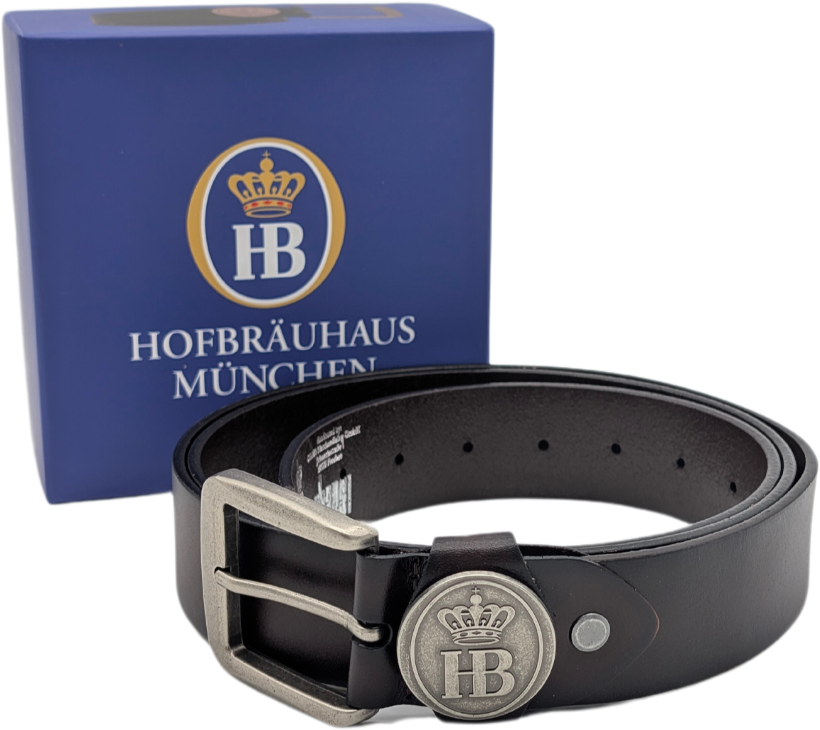 Schwarzer HB Ledergürtel im Antik-Stil mit Metallschnalle und Hofbräuhaus-Logo, präsentiert vor blauer Geschenkbox.